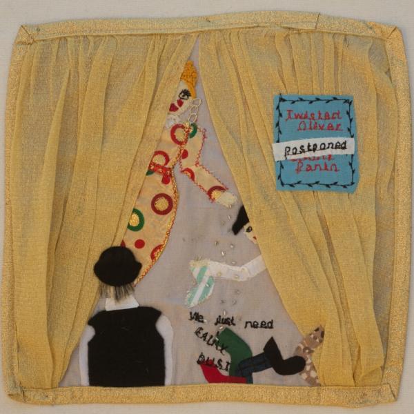 Quilt square designed as a window with curtains and figures peeping out with one watching. Sign says postponed.