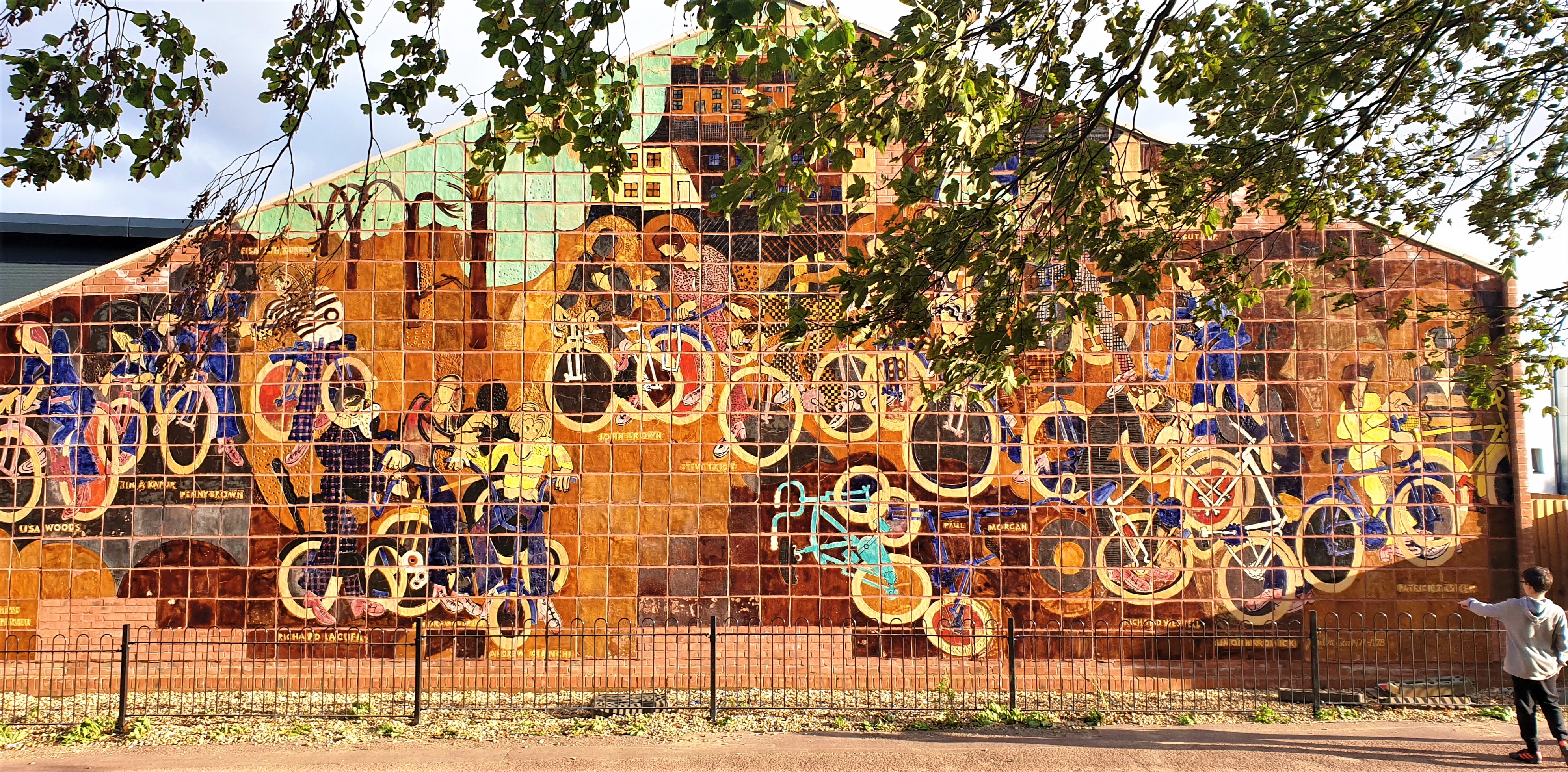 Ceramic tile wall mural depicting cyclists, at Stantonbury, Milton Keynes