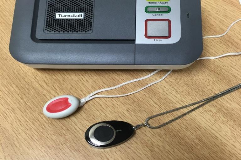 Standard telecare alarm box with pendant and wrist worn sensors