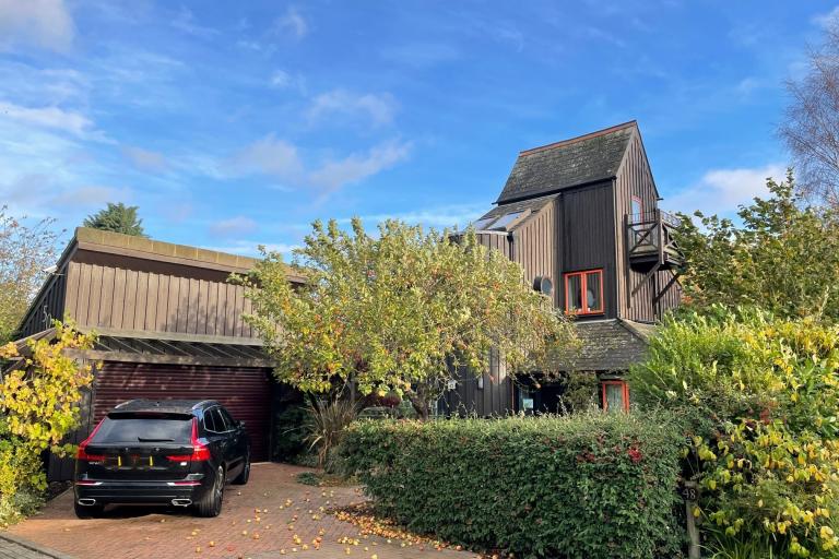 Photo of one of the Homeworld '81 Expo Houses in Bradwell Common.  This house was an entry from New Zealand and had an unusual windmill tower design.