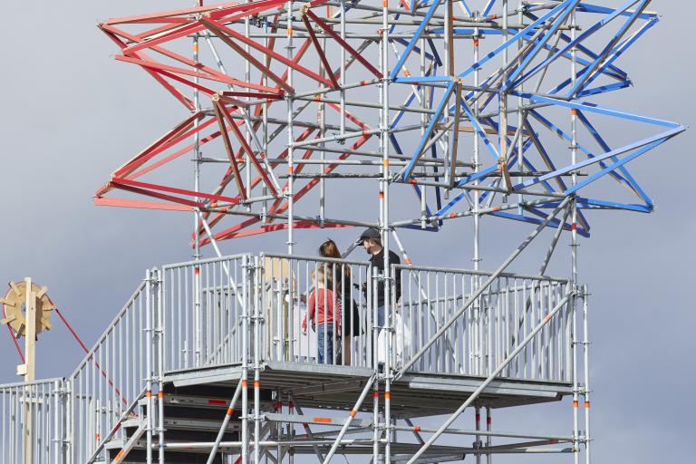 Children climbing on the Festival of Creative Urban Living structure