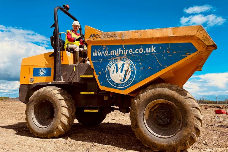 Cllr Zoe Nolan on a dumper truck