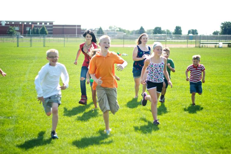 kids-running-on-school-field