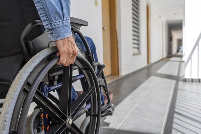 Man using specialised wheelchair