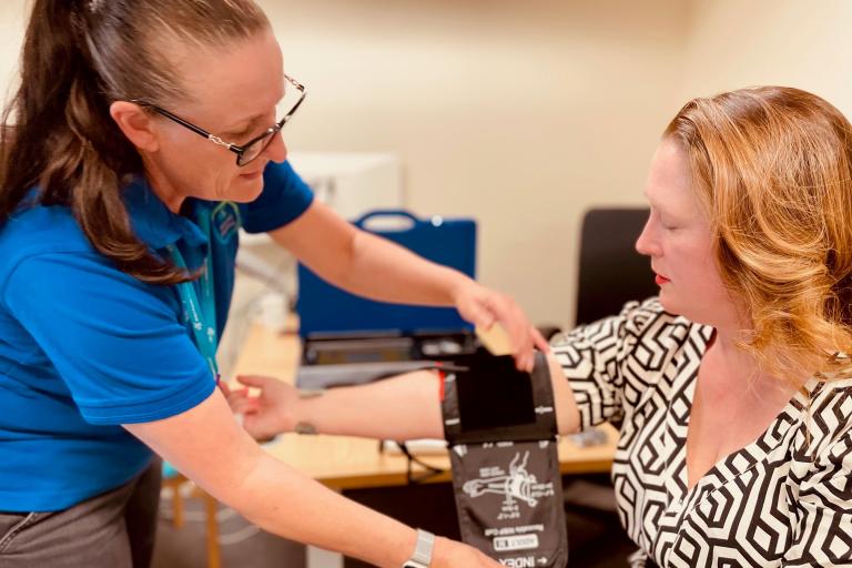 Cllr Emily Darlington receiving health checks via the blue box