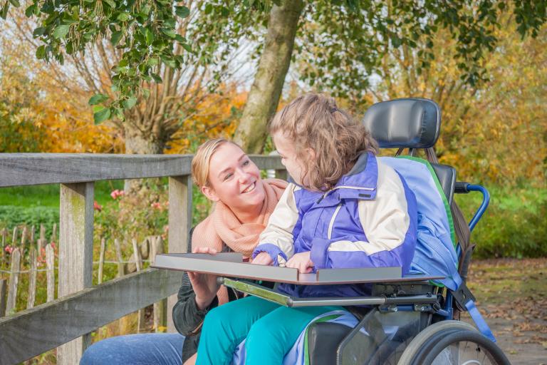 Parent carer with child in wheelchair