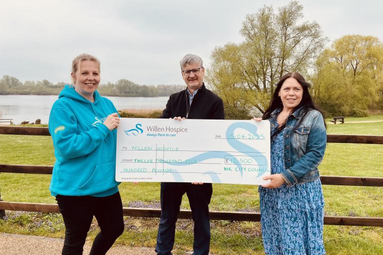 Councillor Mick Legg presenting the cheque to Willen Hospice