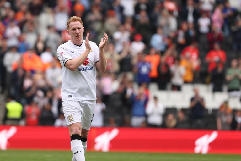 Dean Lewington clapping fans