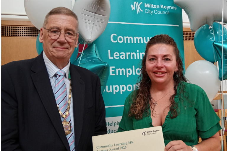 Deputy Mayor Cllr Paul Trendall with an adult learner receiving her award