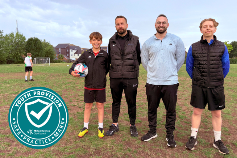 Councillor Joe Hearnshaw with young people at a football session run by Lets Kick It