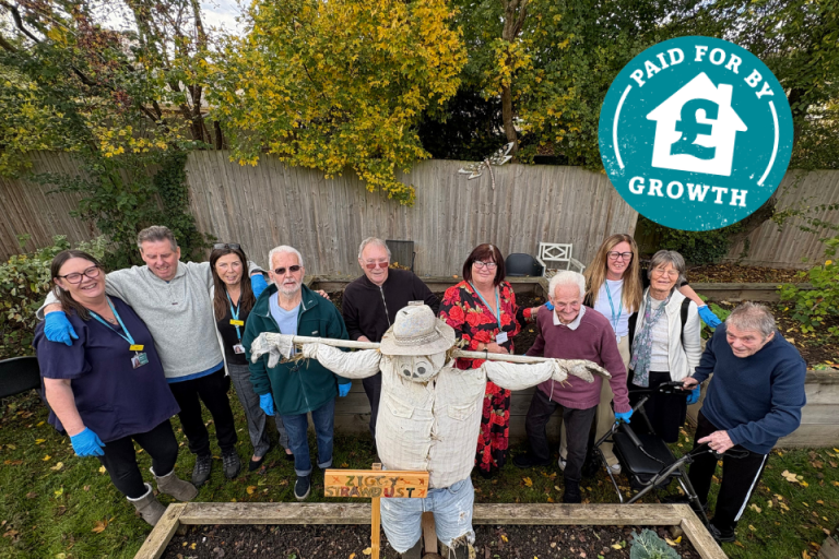 Cllr Donna Fuller with service users and staff at Simpson Day Centre