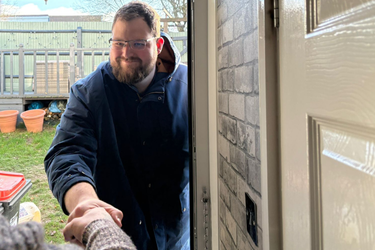 Cllr Ed Hume visiting resident