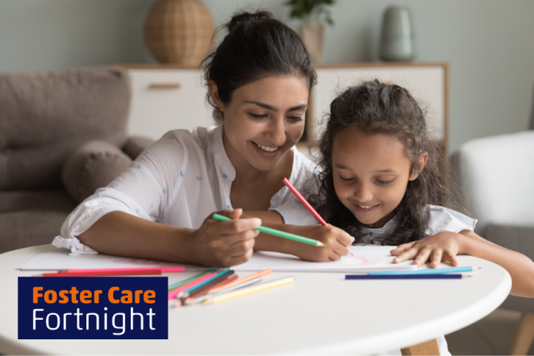 Foster mum and child drawing together