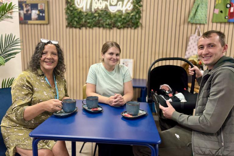 Parents with their young child at Moorlands Family Centre cafe