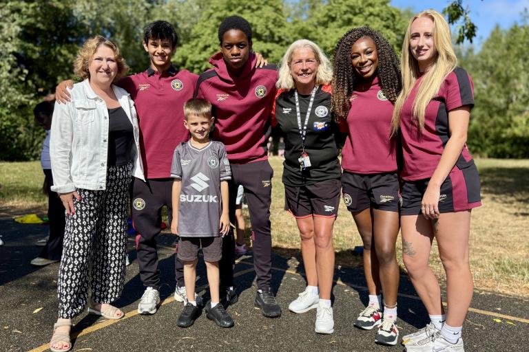 Cllr Jane Carr with players from the MK Dons Men's and Women's Teams