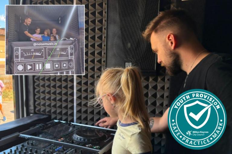 A young child learning music and DJ skills with On the Decks