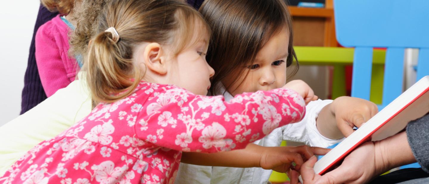 Toddlers enjoying a story time