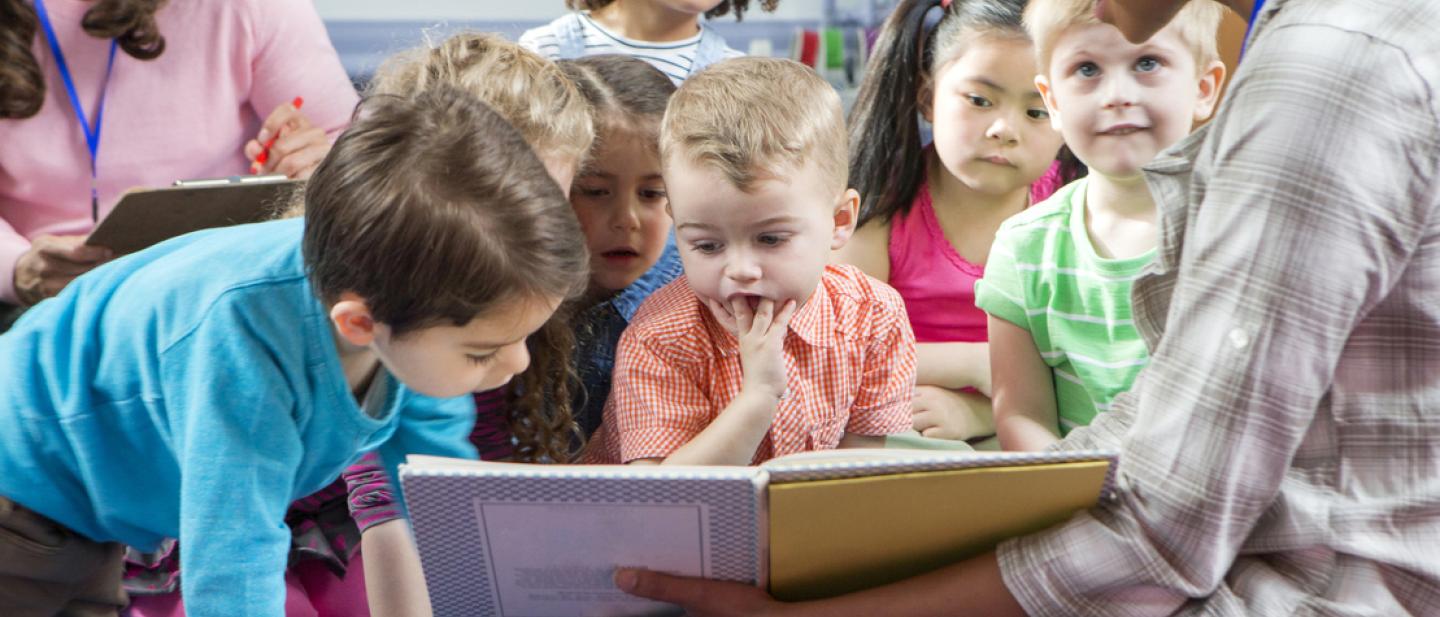 Young children enjoying songs and stories