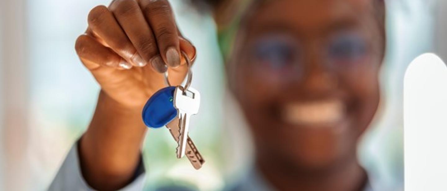 Person holding some keys