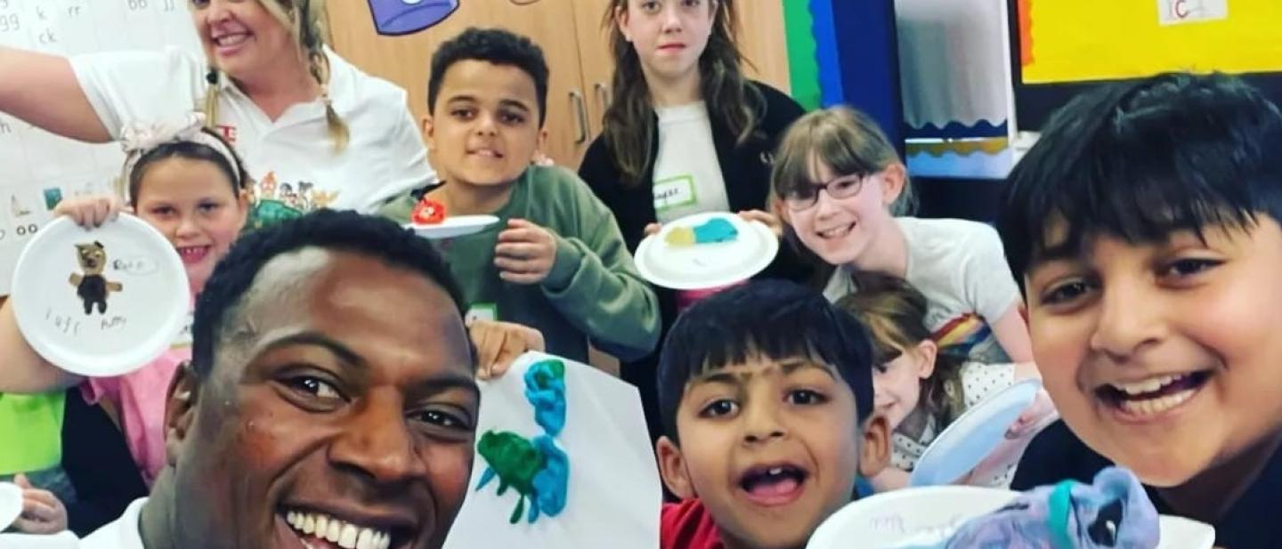 Children and adults enjoying craft activities