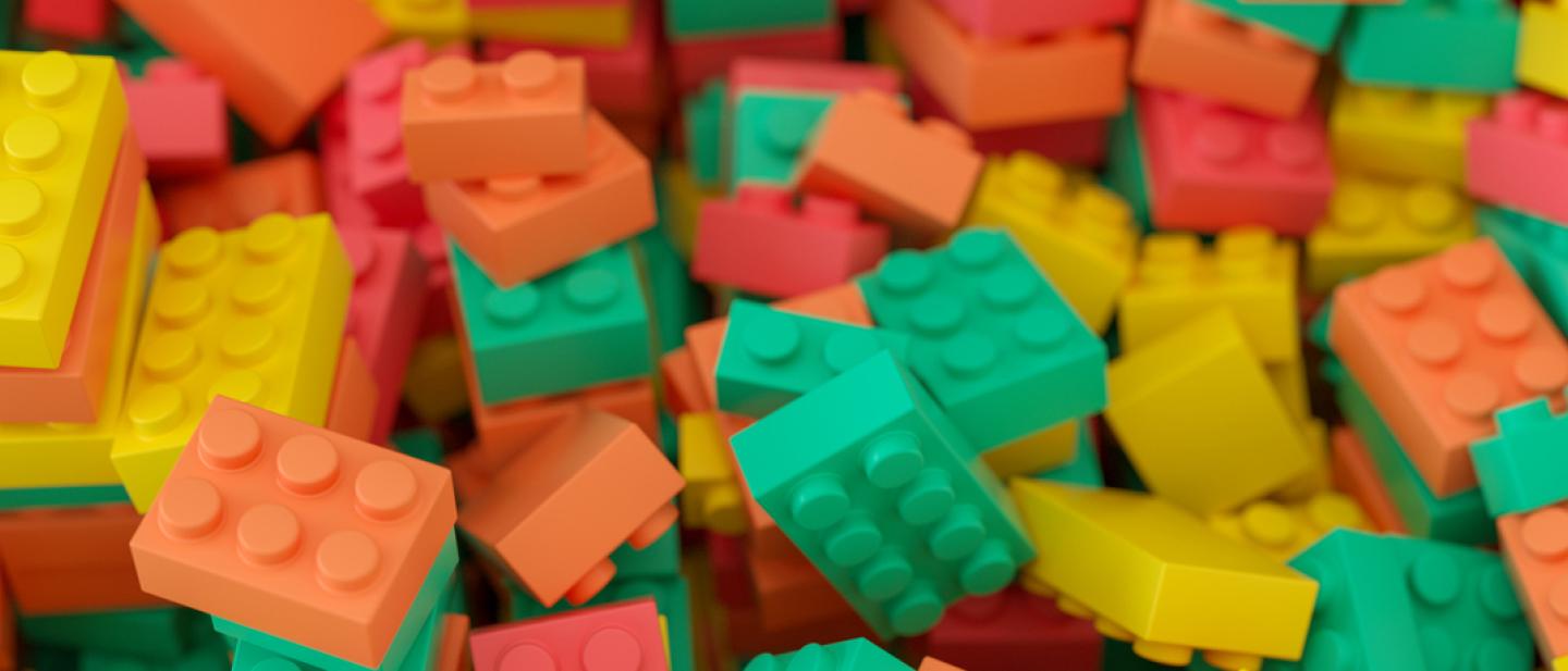 A jumbled pile of brightly coloured Lego bricks.