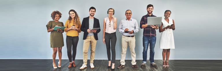 Line of people with different devices to read