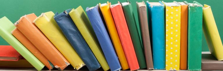 Row of books falling over