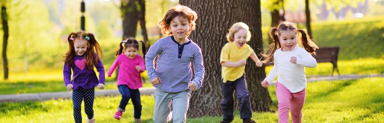 children running on grass