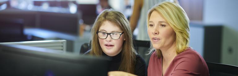 two people at a computer