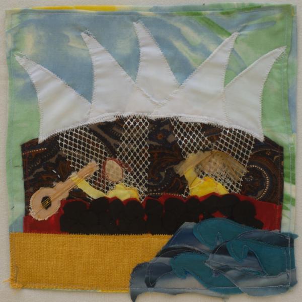 Quilt square using different materials to show a live band scene by the seaside.