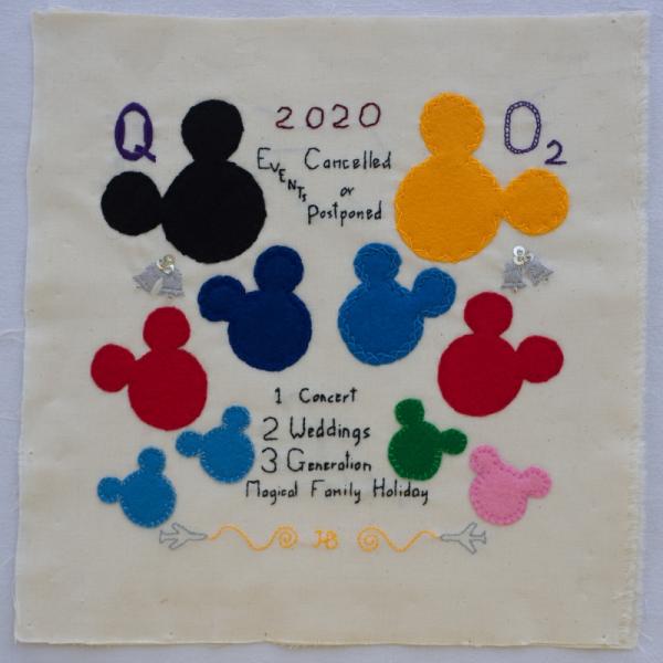 Quilt square with different sized and coloured Mickey Mouse symbols and embroidered text: 2020 Cancelled or Postponed events. 1. Concert 2. Weddings 3. Generation Magical Family Holiday